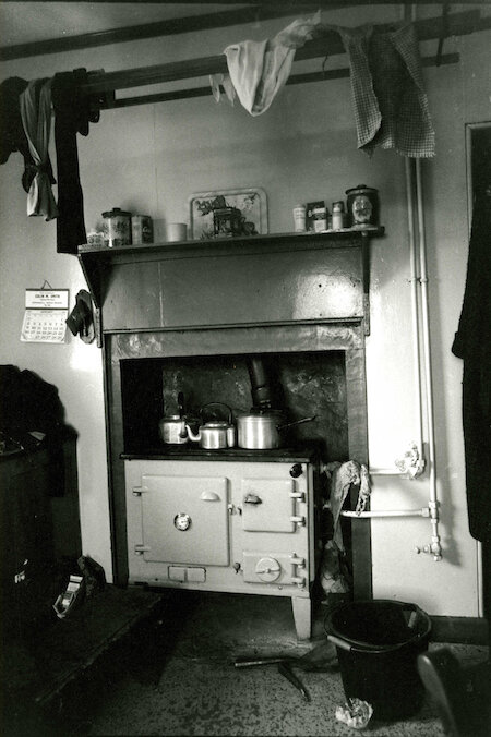 Tradition out of sight, but not out of mind. By the 1970s islanders like Peggy MacPhail at Arnol in Lewis, burnt peats in the ubiquitous Rayburn stove.