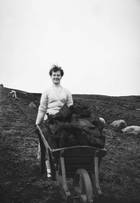 Changes came to how folk got their peats home in the 20th century. Maureen Smith (Whiteness, Shetland), could now handle a far bigger load at one time by wheelbarrow.